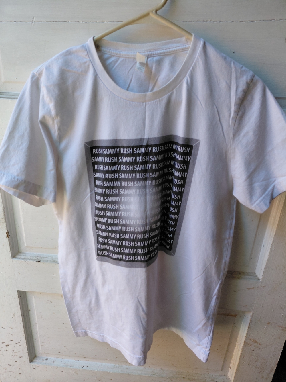 White Graphic SAMMY RUSH Tee with Black Repeated Text Panel